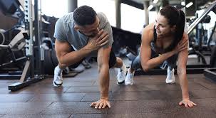 Toning Bingo Wings: Your Ultimate Guide to Sculpting Sleek Arms at the Gym 3 Fitness trainer demonstrating arm toning exercises Rainham