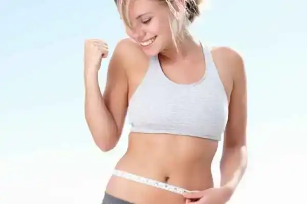 Unraveling the Mystery: Where Does the Body Fat Loss From First? 3 Image of woman happy with fat loss Rainham
